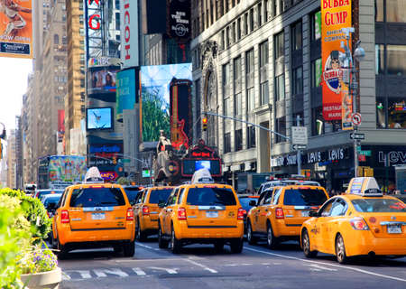 New York, NY, USA - May 17, 2013: Times Square, featured with Broadway Theaters and huge number of LED signs, is a symbol of New York City and the United States, May 17, 2013 in Manhattan, New York Cityのeditorial素材