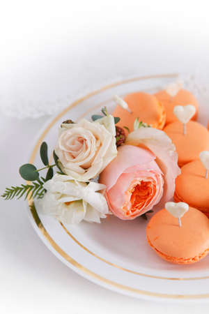 Cakes and boutonniere with rosesの写真素材