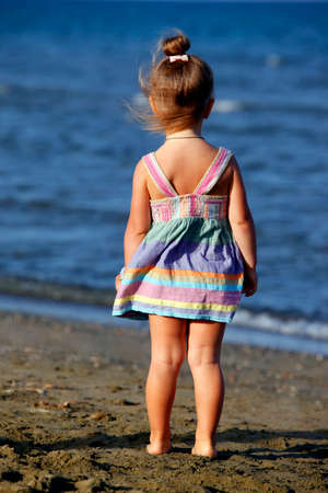 Small girl on the beach in Larnaka, Cyprusの写真素材
