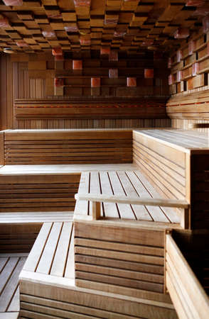 Interior of a wooden Finnish saunaの写真素材