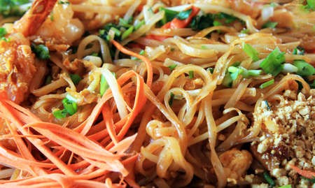 The chicken with rice noodles with fork close upの写真素材