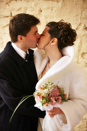 Beautiful the bride and the groom kissの写真素材
