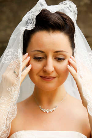 Portrait of the beautiful bride in a veilの写真素材