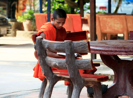 Siem Reap, Cambodia - April 07, 2014: Unidentified young monk of temple, Angkor Wat, Siem Reap on November 7, 2014, Cambodia.のeditorial素材