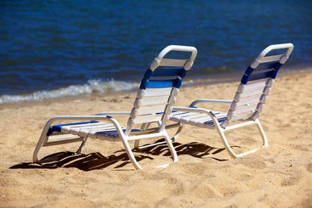 Reclining chairs on the shore of Lake Tahoeの写真素材