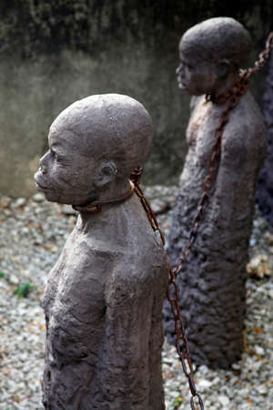 A statue in Stone Town. Zanzibar dipicting and mourning the African slave tradeのeditorial素材