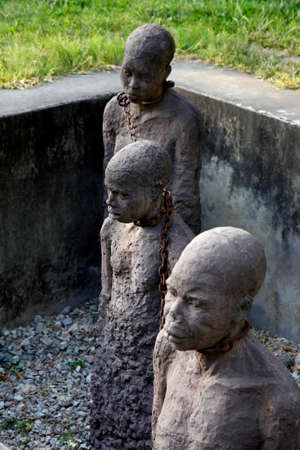 A statue in Stone Town. Zanzibar dipicting and mourning the African slave tradeのeditorial素材