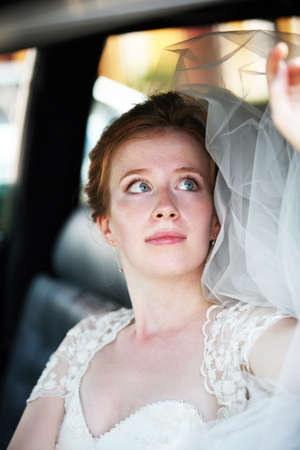 Beautiful the bride in carの写真素材