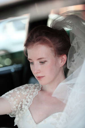 Beautiful the bride in carの写真素材
