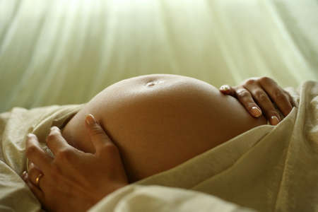 The pregnant woman on the ninth month. The girl was born