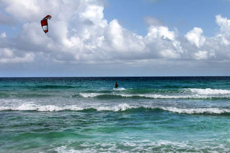 Kiteboarder enjoy surfing in water.の写真素材