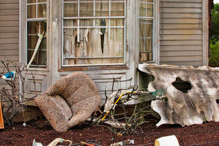 Wooden house damaged by disaster.の写真素材