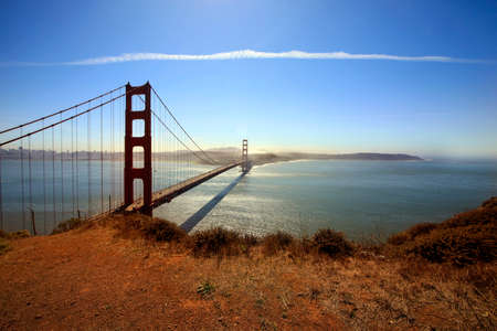 Golden Gate Bridge and San Francisco Bay at sunsetの写真素材