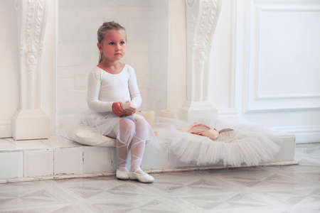 Little Ballerina. Dancer Girl Wearing White Tutuの写真素材