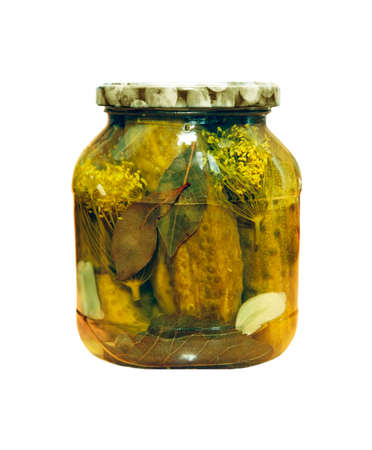 Glass jar of pickled cucumbers isolated on whiteの写真素材