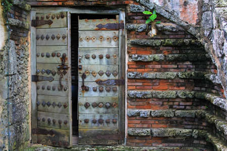 Wooden antique door in Altos de Chavon, La Romana, Dominican Republicの写真素材