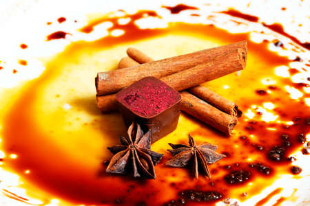 Chocolate candy isolated with anice and cinnamonの写真素材