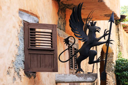 Metal mythical decoration on the facade of the building in Altos de Chavon. Dominican Republicの写真素材