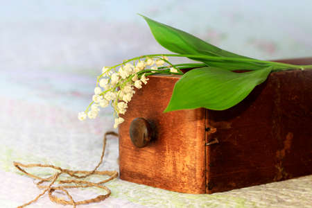 Bouquet of Lilies of the Valley in wooden boxの写真素材