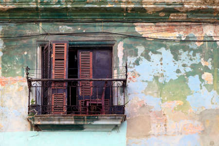 Old balcony isolated on cement wallの写真素材
