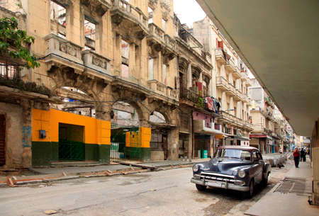 Havana, Ð¡uba - January 10, 2019: Vintage cars moving on the streets of colorful Havana. A great variety of old cars exist In Cuba. On the streets cars from the first half of the 20th century can be found in magnificent conditions, which takes back in hisのeditorial素材