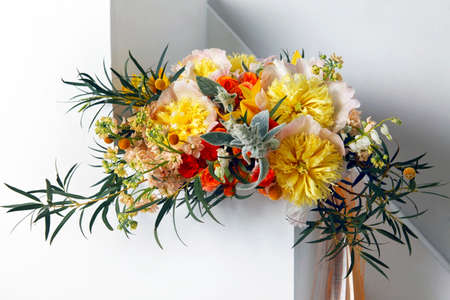 Wedding bouquet of roses, orchids and peoniesの写真素材