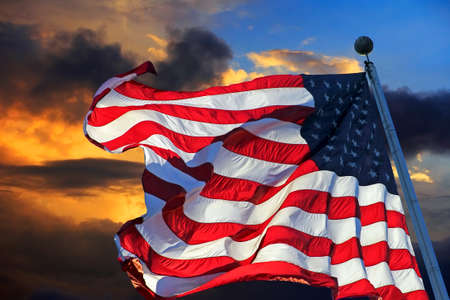 American flag against the skyの写真素材