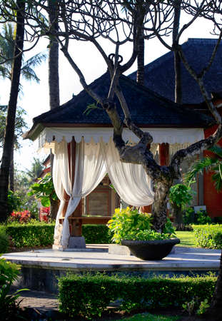 Arbor with white curtains for relaxation or meditation. Bali Island, Indonesia.のeditorial素材