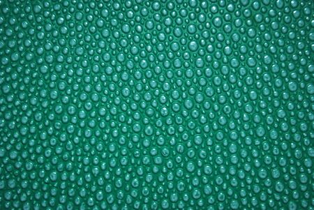 rough uneven grunge turqoise color backgroundの写真素材