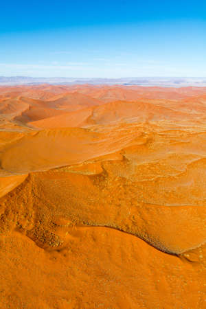 Airwiew of the dunes and sourounding region of the Sossusvlei. Here you find the worlds highes sand dunes. Located in Namib Naukluft Park, Namibia, Africa.のeditorial素材