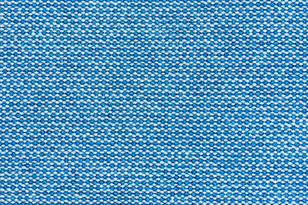 Detailed Close-Up of a colored fabric pattern for background purposesの写真素材