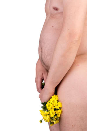 View on the belly of an overweighted male with withered flowers in front for concept of impotence - isolated on white backgroundの写真素材