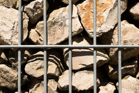 view of a metal cage for stones, seen in cologne, germany