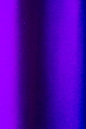 Detailed view of a blue metallic can with light reflections and color hueの写真素材