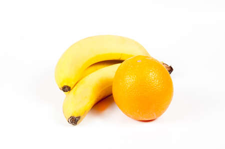 Banana with an orangeの写真素材