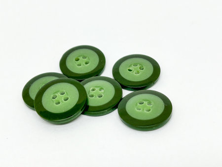 Green buttons isolated on white background. Clipping path included in file.の写真素材