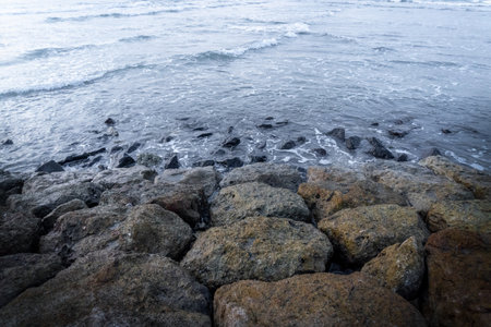 rocks in the sea, close up of photo with shallow depth of fieldの写真素材