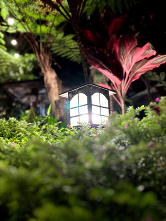 Lantern in the garden at night. Selective focus.の写真素材