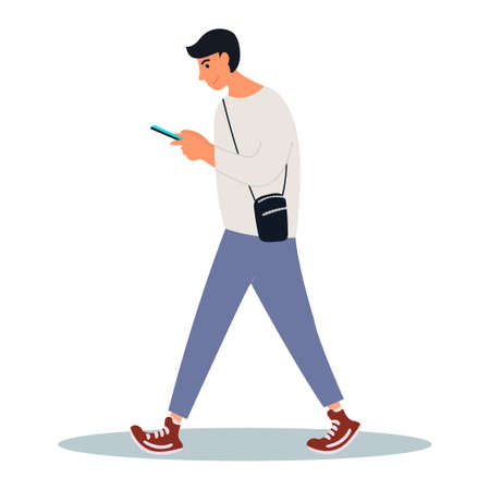 A young man looks at his smartphone on a walk. Man is scrolling news feed.Vector illustration on white background in cartoon style.のイラスト素材
