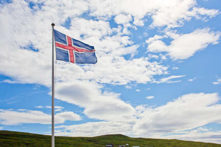 Iceland flag waves in the skyの写真素材