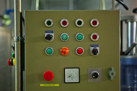 Control board with many buttons in a factory