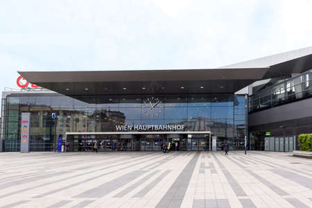 VIENNA, AUSTRIA - MAY 18, 2016: Facade of the main railway station of wien with OBB logo company and peopleのeditorial素材