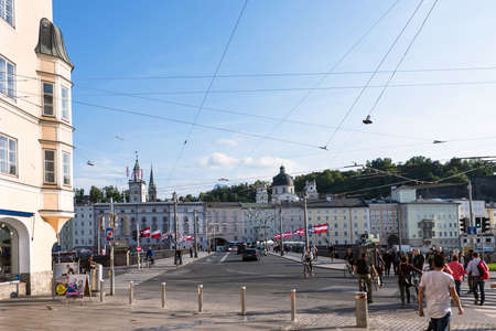 SALZBURG, AUSTRIA - MAY 18, 2016: City street at the bridge with peopleのeditorial素材