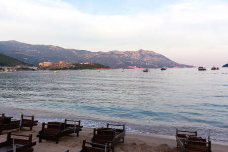 Budva the old town cloudy sky over buildings and clean sea at sunset, montenegro, europeの写真素材