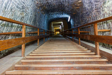 Sovata salt mine tunnel entrance with wooden stairs, romania