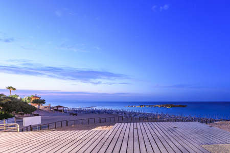 Evening view on sea and the beach with boats, protaras, cyprus island