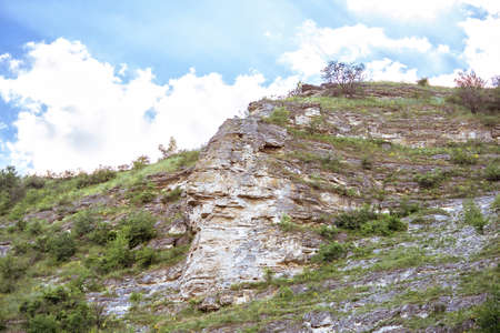 Wonderful landscape with rocks and mountains at orheiul vechi memorial in moldova, near raut river, blue sky, sunny day, eco butuceni villageの写真素材