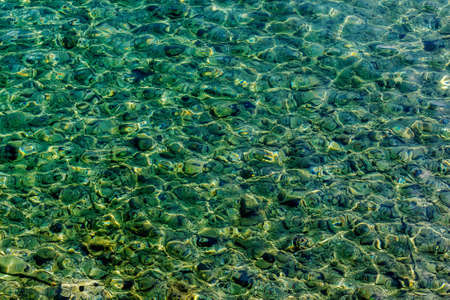Clear water texture photo on Corfu island in Greeceの写真素材
