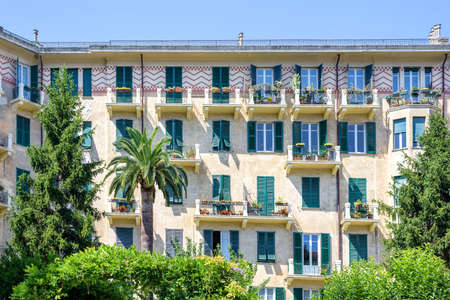 Beautiful daylight view to facade of apartments or hotel in Santa Margherita Ligure city, Italyの写真素材
