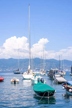 Daylight view to ships cruising on water near Portofino city in Italyの写真素材